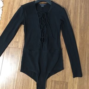 Laceup deep v neck bodysuit. Size S