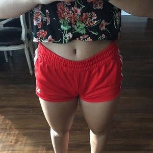 Red adidas shorts