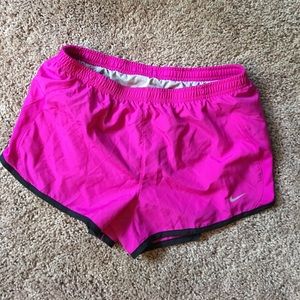Fuchsia Nike running shorts