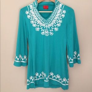 Turquoise tunic with white embellishment size S