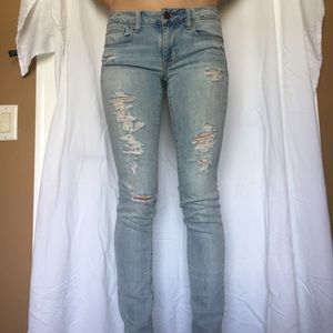 Mid rise faded destroyed American Eagle jeans