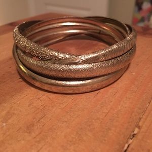 5 connected gold bangles