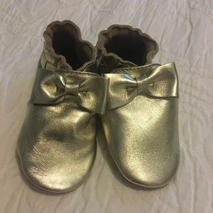 Brand New Gold Robeez Moccasins.