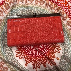 Coral snakeskin wallet