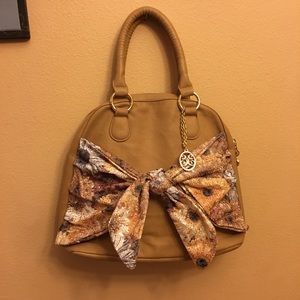 Brand new leather, bow design purse
