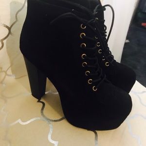 Black lace up boots.