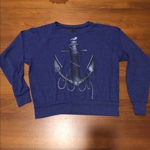 Blue anchored long sleeved shirt.