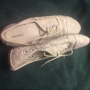 Cream lace up shoes