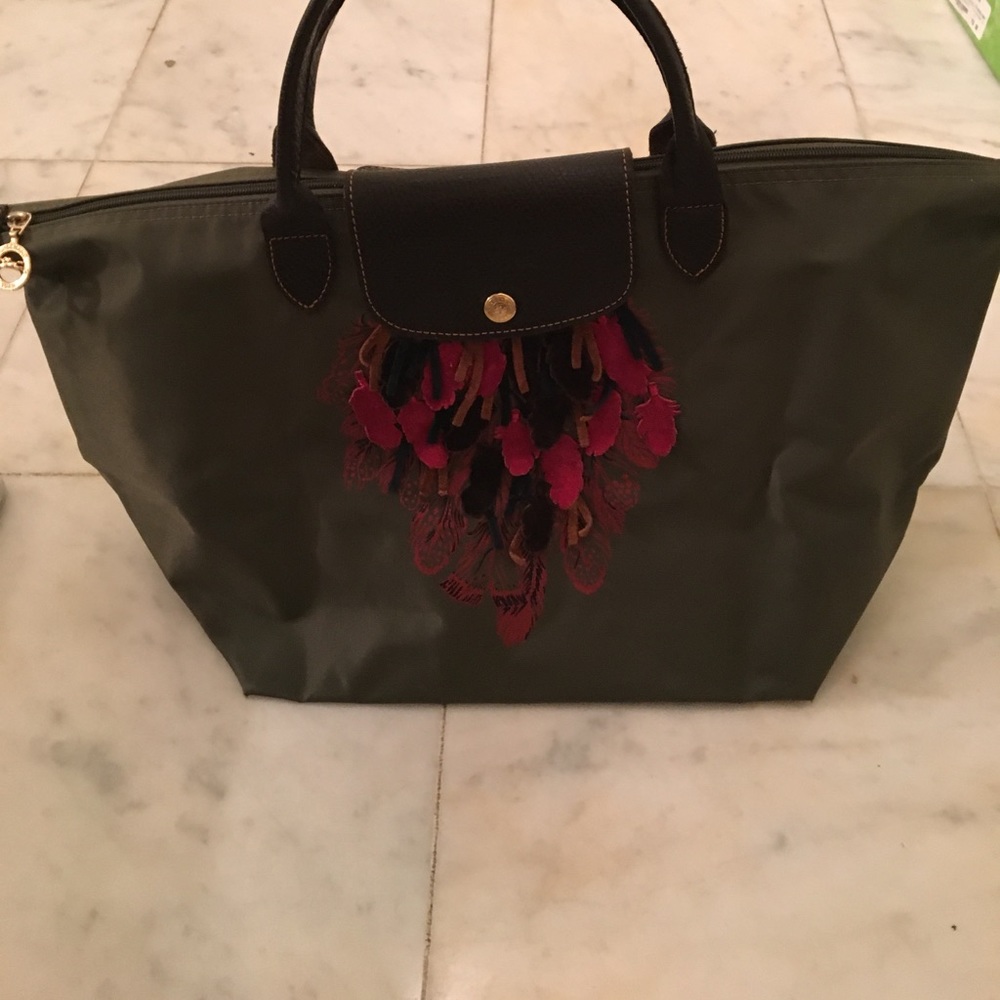 Green Longchamp Purse with Suede Feathered Details