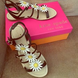 Kate Spade black Collin Daisy T-strap sandal.