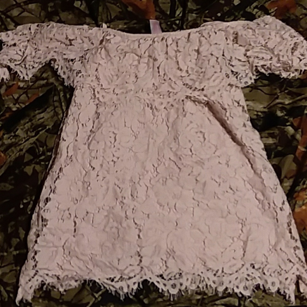 A lace off the shoulder shirt