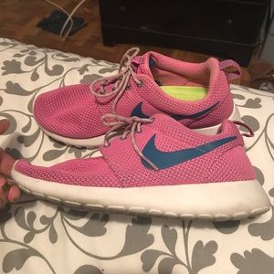 Pink and blue Nike roshe
