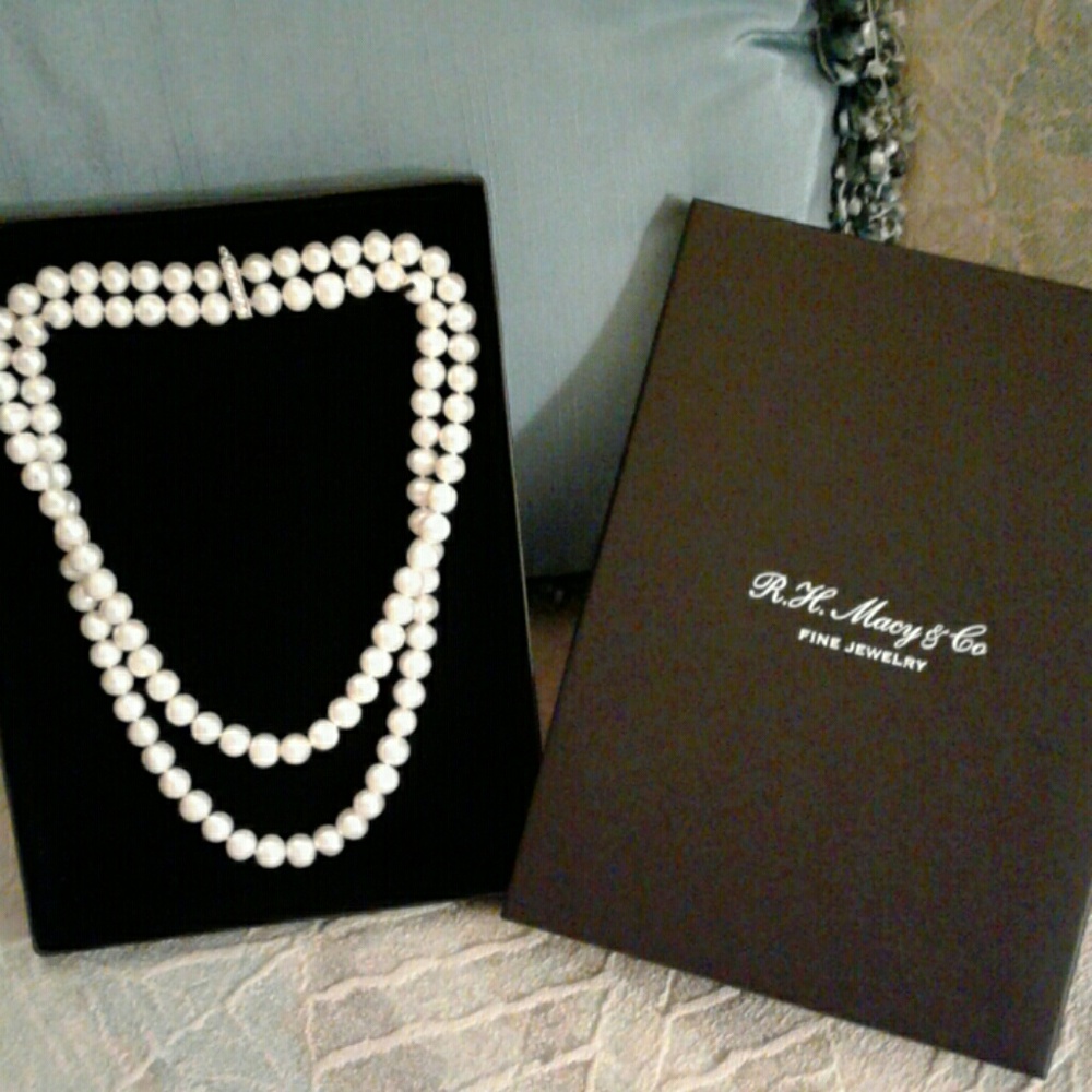 Genuine cultured pearls.  Never worn. Double