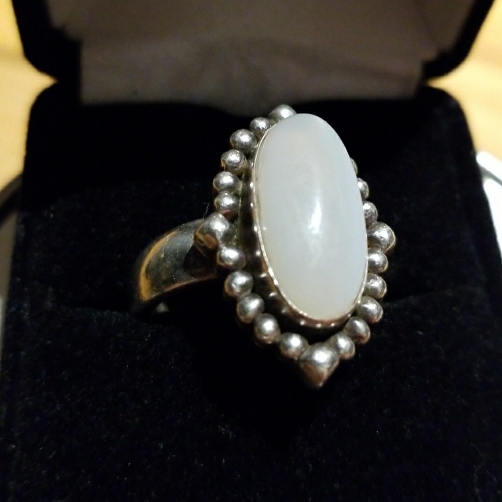 Silver ring with white clear stone