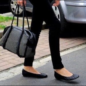 Black leather flats
