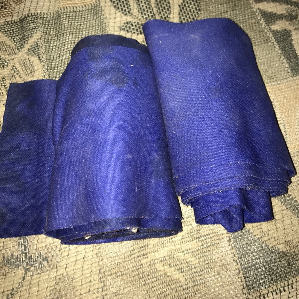 Three dark blue polo wraps for horse