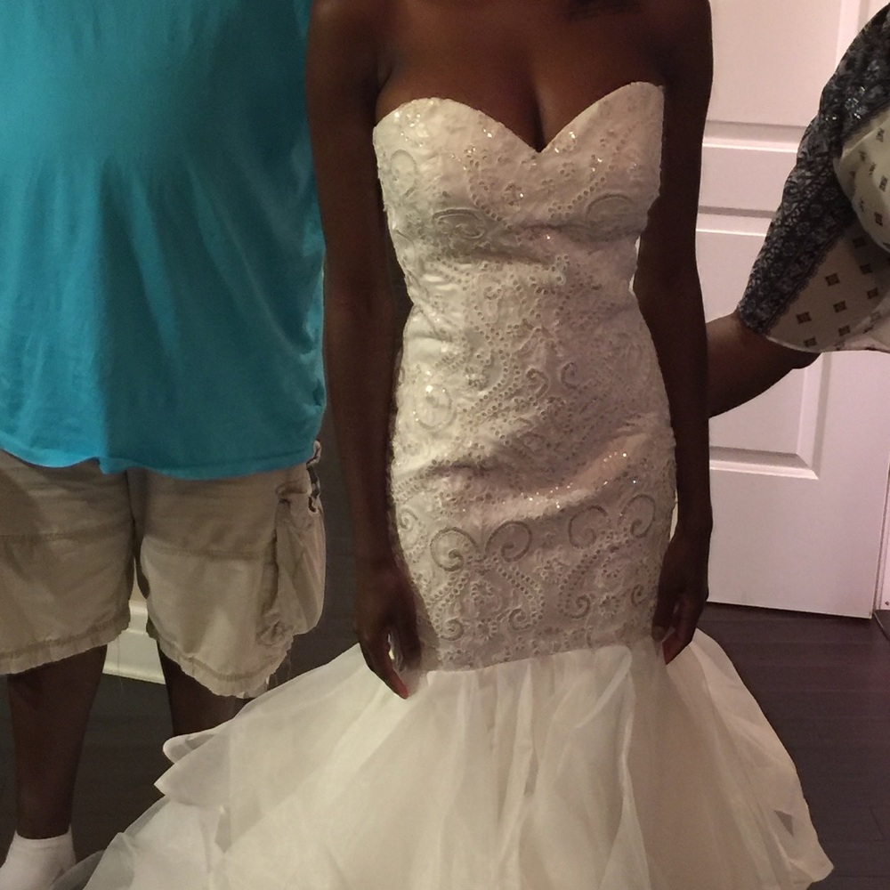 Size 2 wedding dress fits more like a size 3