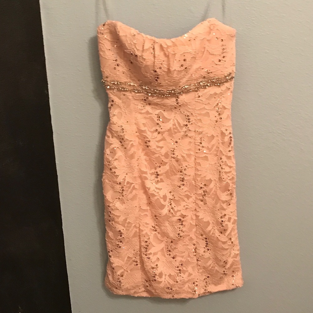 Mini pink dress with lace, sequence, and beading