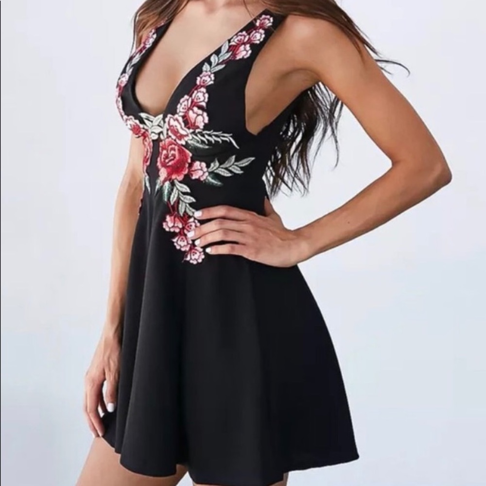 Sold Black dress with rose embellishments