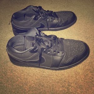 Jordan 1 Low Top all black shoe with suede top.