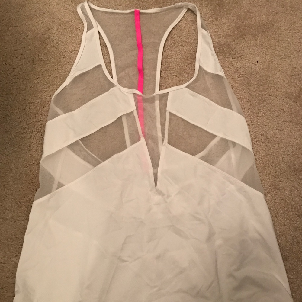 Lululemon tank. "If you're lucky" in white