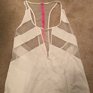 Lululemon tank. "If you're lucky" in white