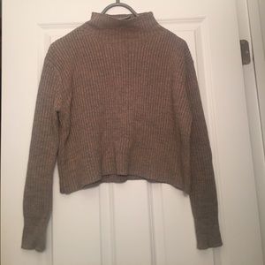 Cropped funnel neck sweater.