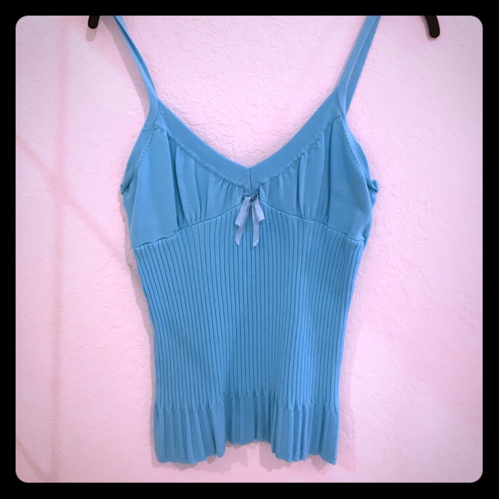 Cute top says Large but I think more of a med