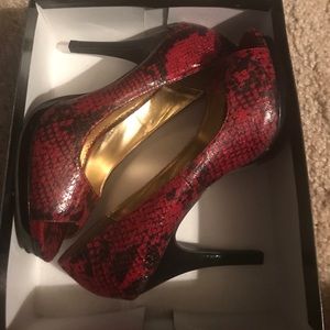 Rampage red and black snake skin heels