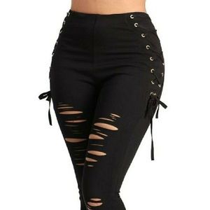 Distressed eyelet lace up leggings
