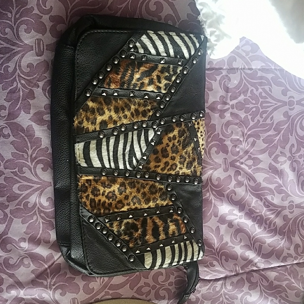 animal print studded clutch