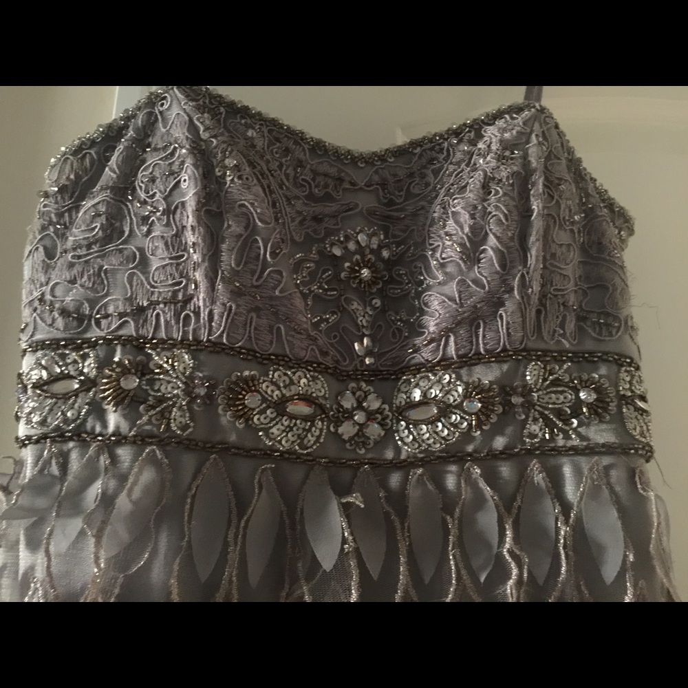 Sue wong dress. It is size 2 but will fit a 4,