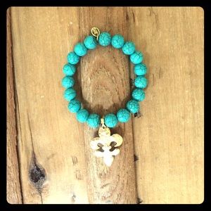Turquoise bead and gold bracelet