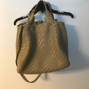 Green purse. Gently used. Minor wear.