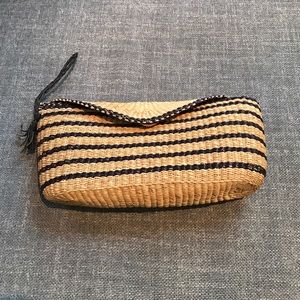 Nautical straw clutch in navy and natural straw