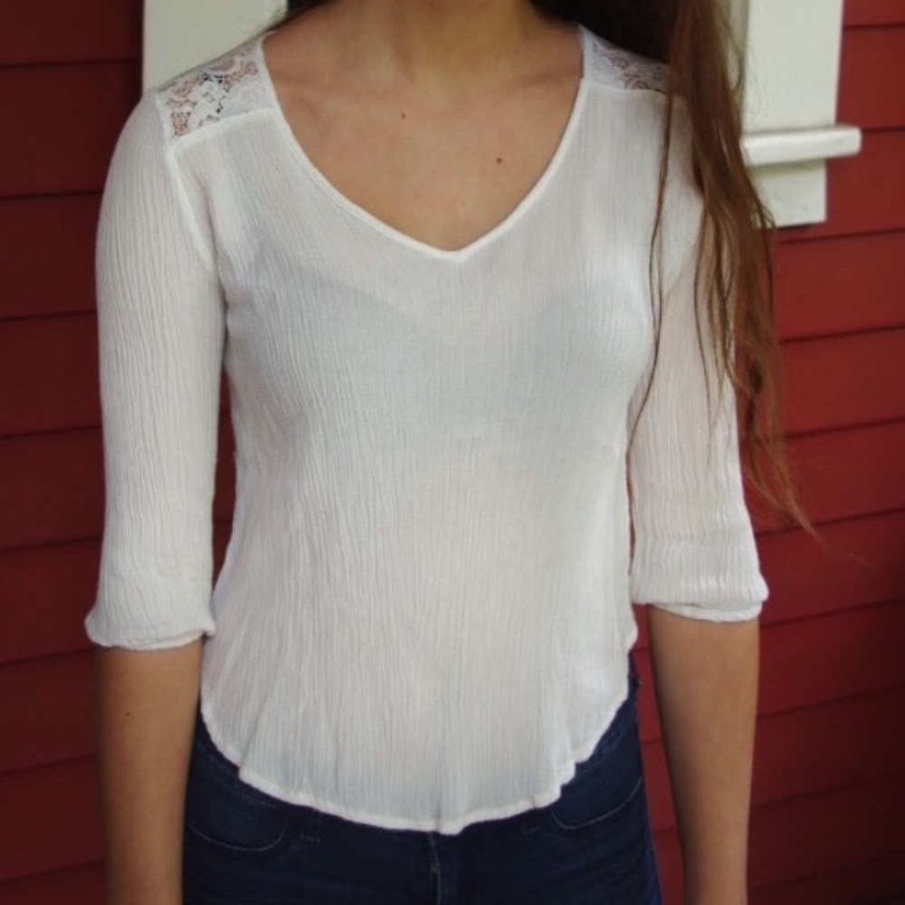 Elegant, white flowy shirt