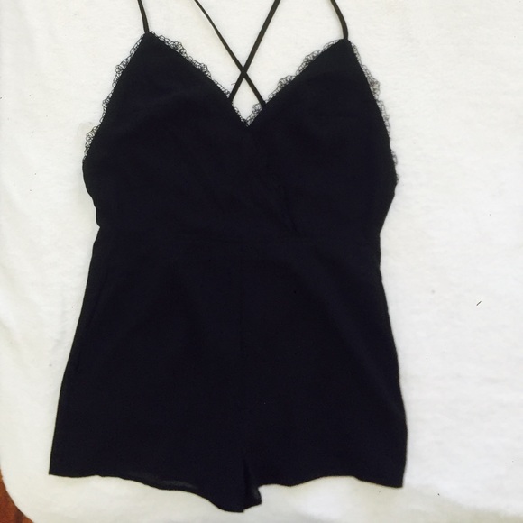 Black, fitted romper with pockets - Picture 1 of 5