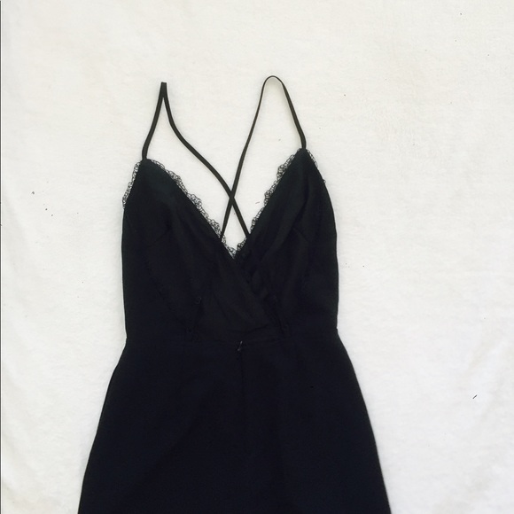 Black, fitted romper with pockets - Picture 2 of 5