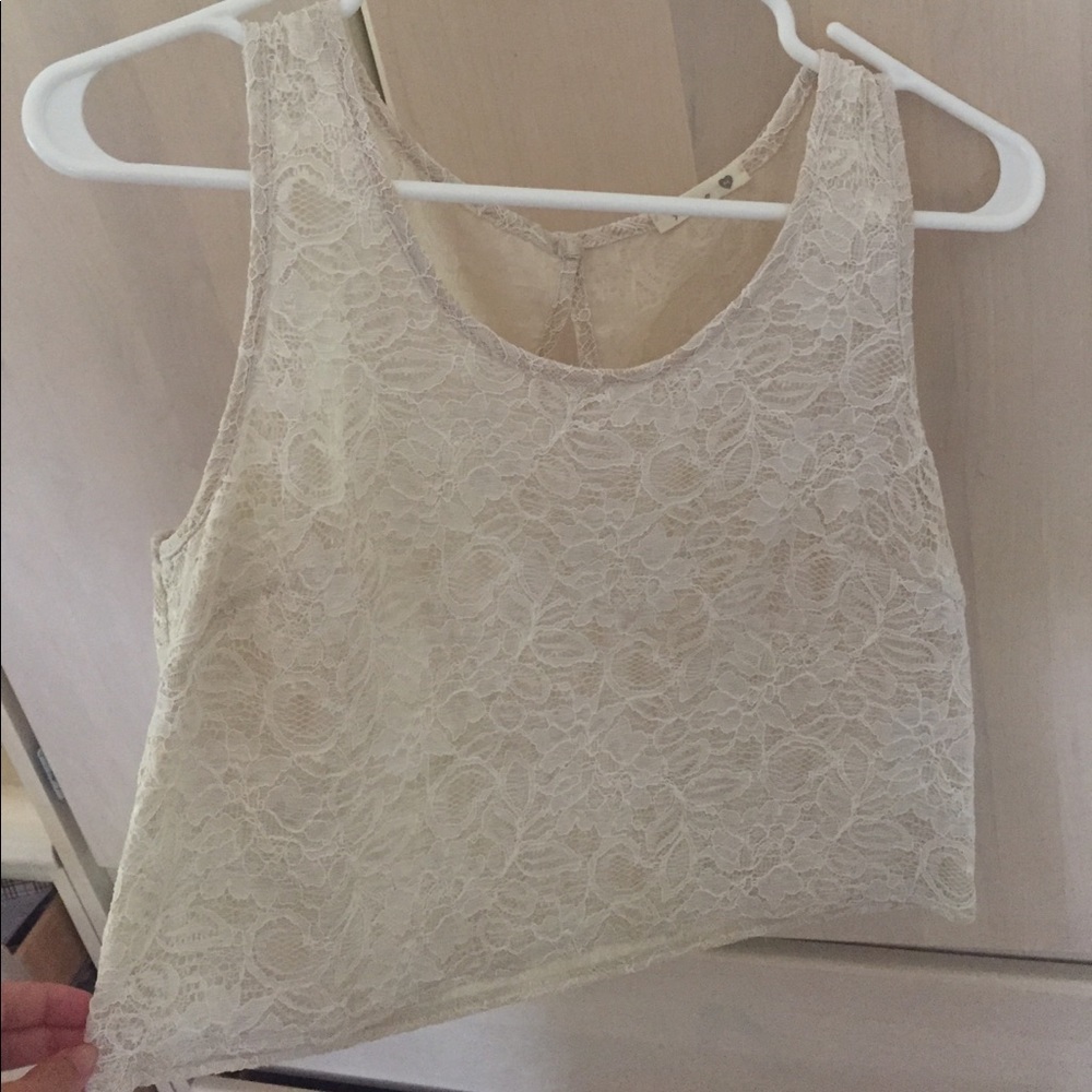 Pretty lace detailing crop top off white