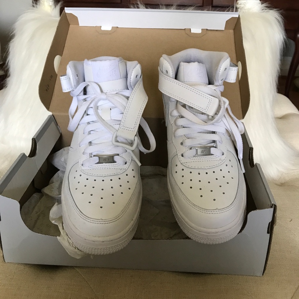 Like new white Air Force 1 with box.- size 6
