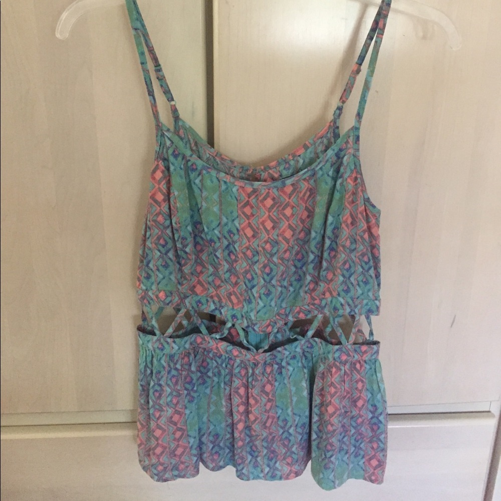 Flowy top with open crosses at midline