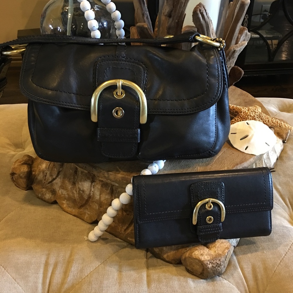 Black leather coach set.