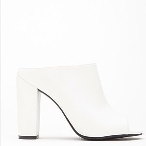 White peep-toe faux leather heels