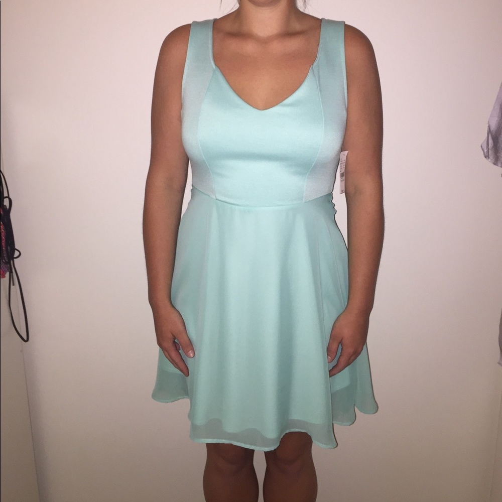 Light seafoam green dress with cut out in back