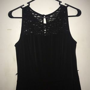 Pleated black dress with lace insert