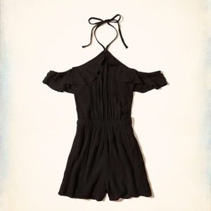 Ruffle cold shoulder black romper