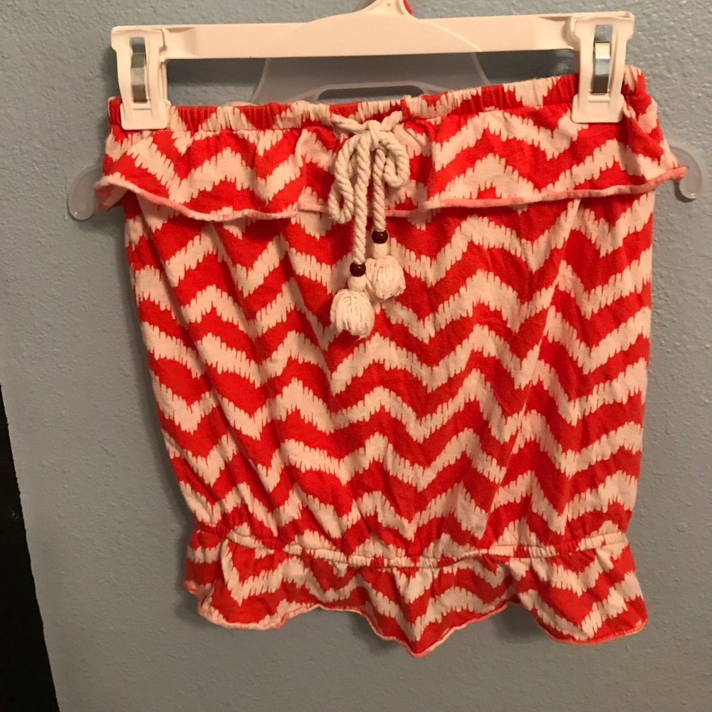 Orange and white sleeveless top