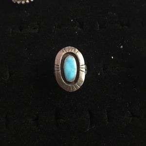 Turquoise ring with arrow design engraved
