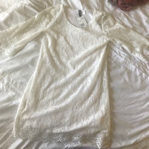 A white, laced mini dress from H&M