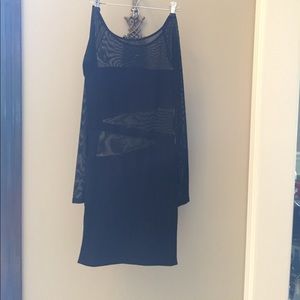 Black body con dress with asymmetrical netting